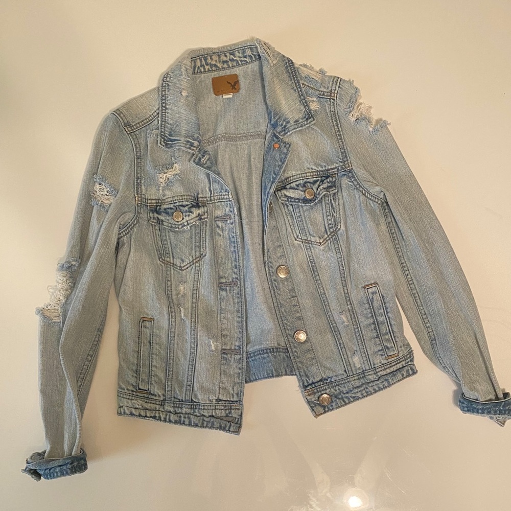 Distressed denim jacket